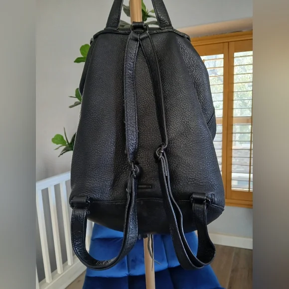 Rebecca Minkoff Isobel Tassel Backpack in Black Pebbled Leather. Rebecca Minkoff Isobel Backpack SKU:8707645 - YouTube main image 3